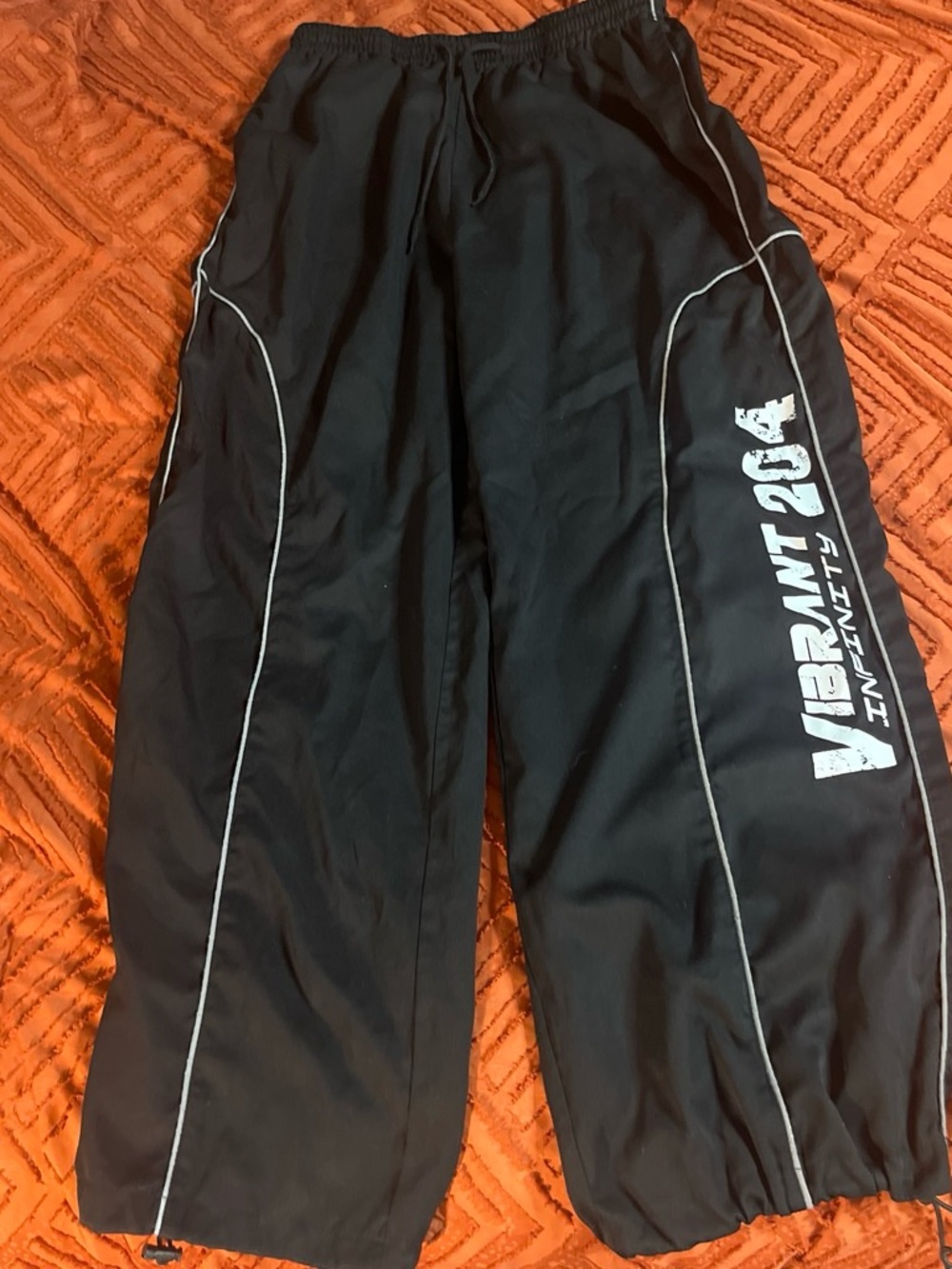 Vibrant Black Graphic Joggers with White Piping